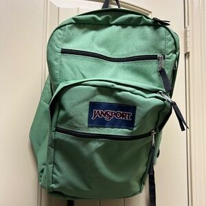 Green Jansport Big Student Backpack